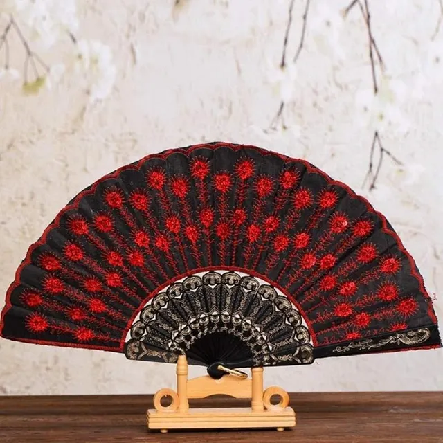 Fan with theme of peacock pens