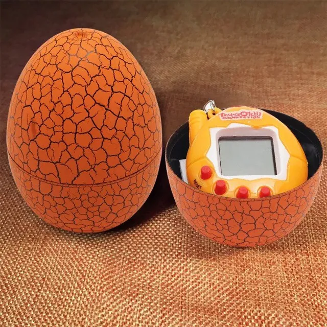 Colored egg with Tamagochi dinosaur - virtual electronic pet - manual digital game O