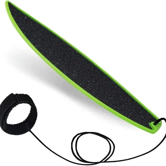 Stylish mini surfboard with shoelace against loss