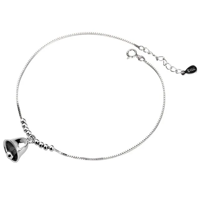 Stylowa damska bransoletka na kostkę w kolorze srebrnym z zawieszką w kształcie dzwonka