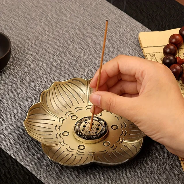 Elegant stand for scented sticks in the shape of a plum flower