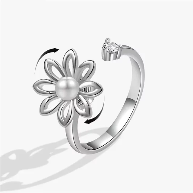 Fashion ring against stress for women with cute rotating design