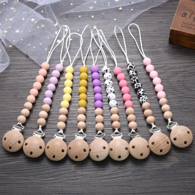 Wooden pacifier clip with silicone bite and round beads