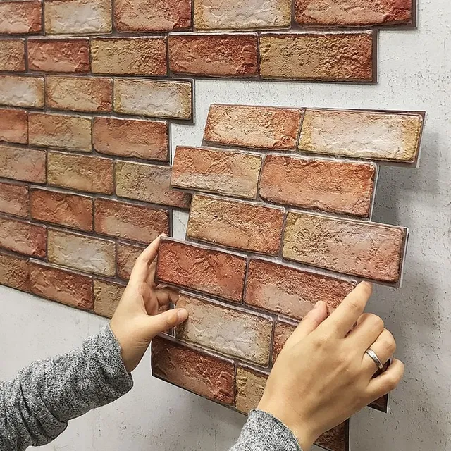 Self-adhesive wallpaper with brick pattern on the wall