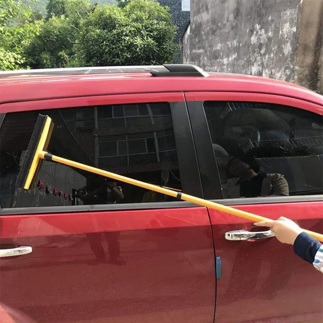 Anti-static broom with rubber bristles and telescopic handle