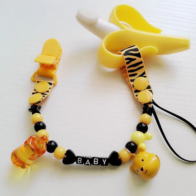 Toy with pacifier necklace © Babysitters