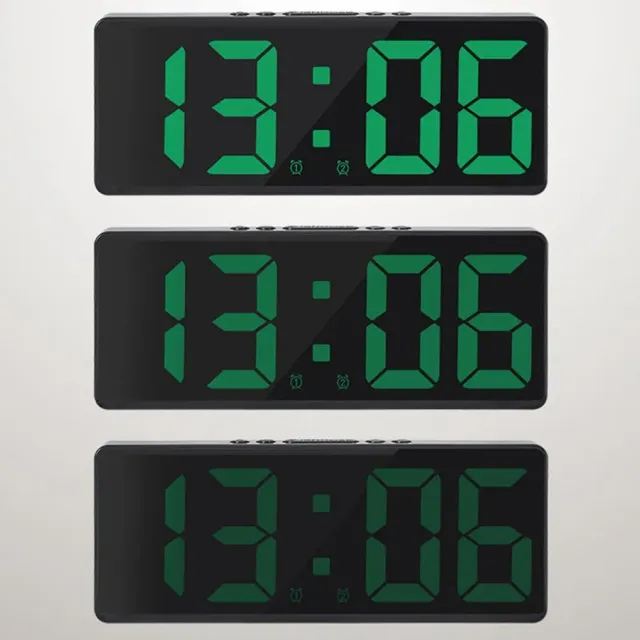 Digital alarm clock with LED display and temperature