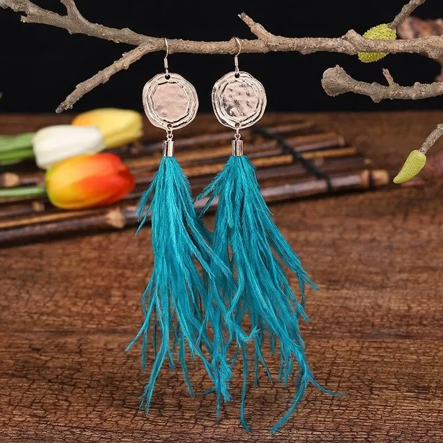 Women's dangle earrings with feathers