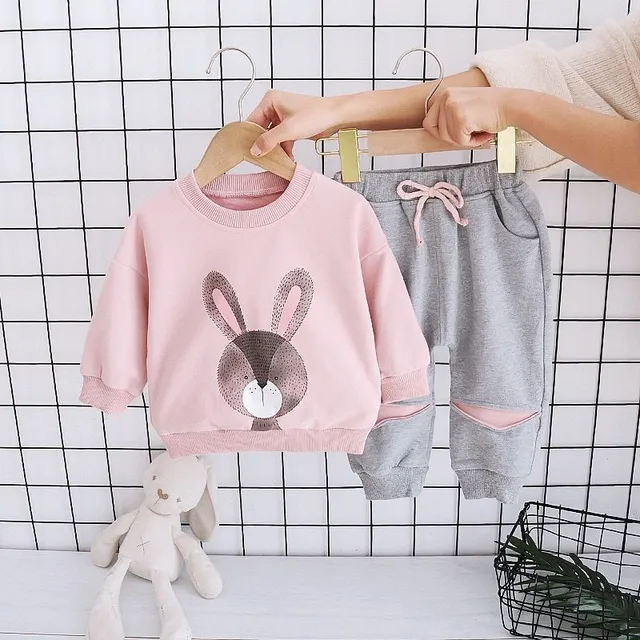 Girl's cute tracksuit in powder pink