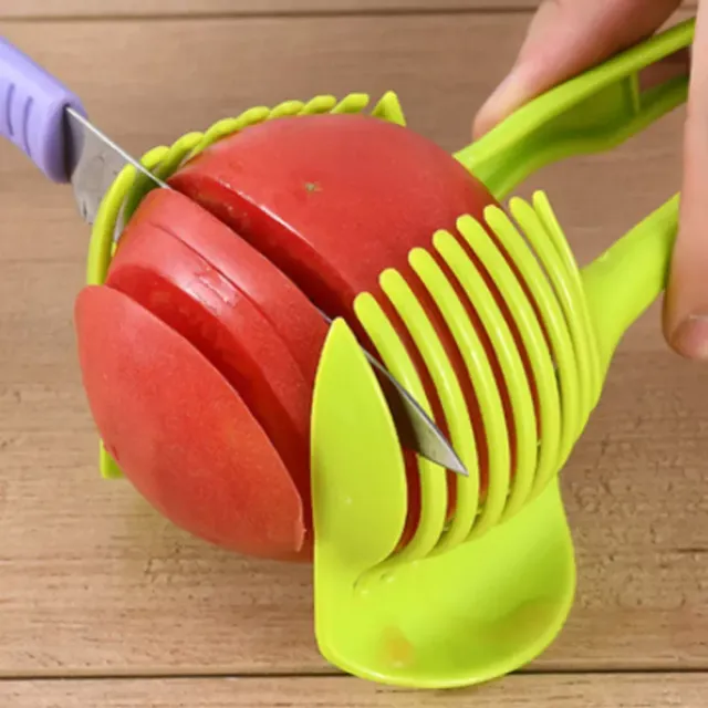 Practical helper in cutting tomatoes and other fruits and vegetables - green color