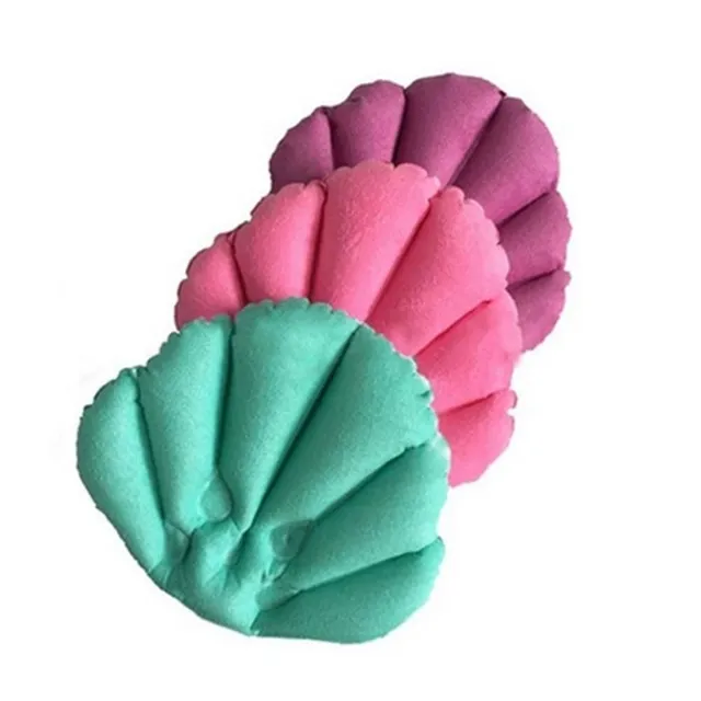 Shell-shaped tub pillow