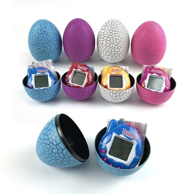 Colored egg with Tamagochi dinosaur - virtual electronic pet - manual digital game