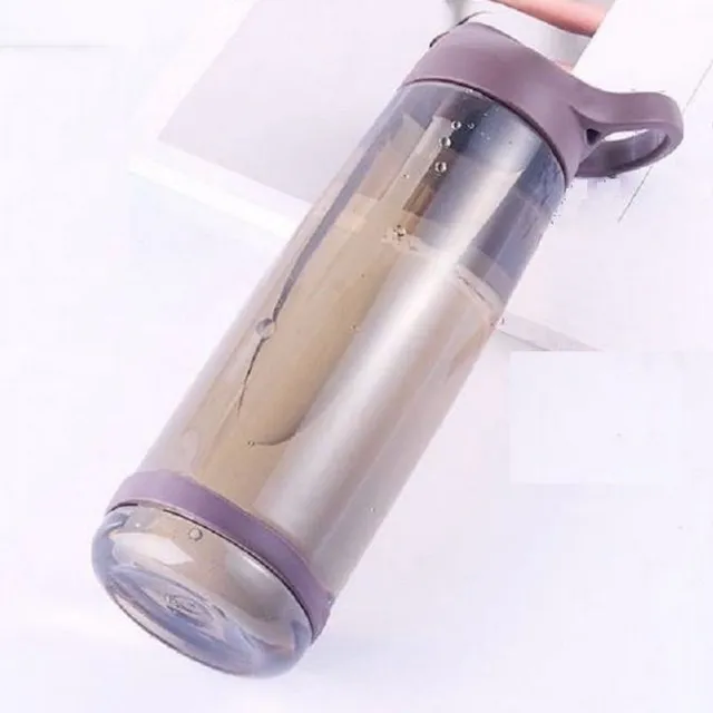 Travel bottle with straw