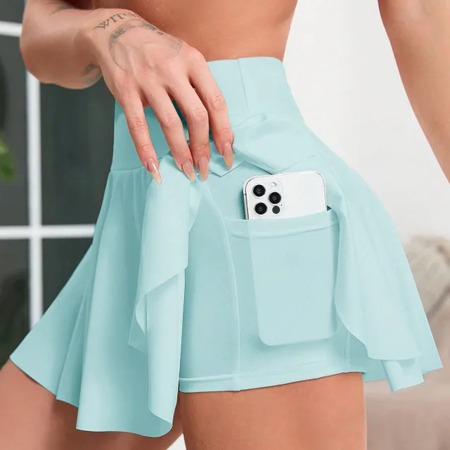 Tennis skirt with a wide ribbon in the waist and a volley line for active movement