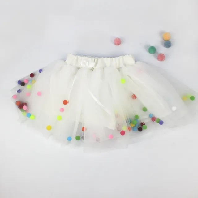 Girl's tutu skirt in tulle with colourful plush balls