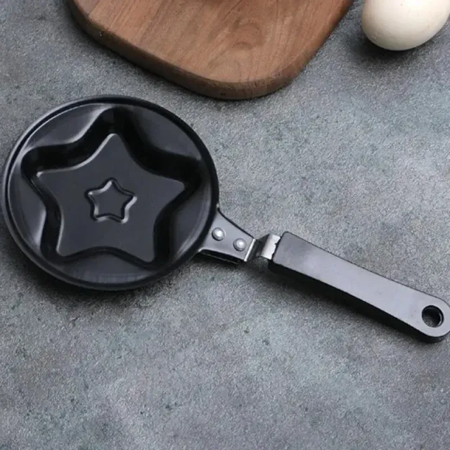 Mini non-stick frying pan for a heart-shaped breakfast for the preparation of omelet