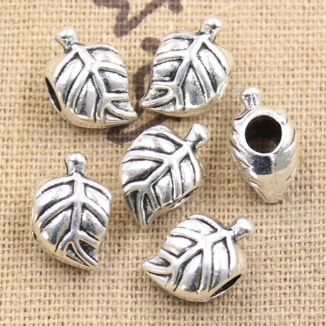 10 pcs of large hole beads with leaves of trees in antique silver color for jewelry production
