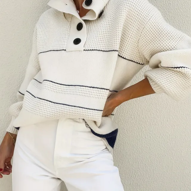 Elegant striped sweater with turtleneck in autumn and winter