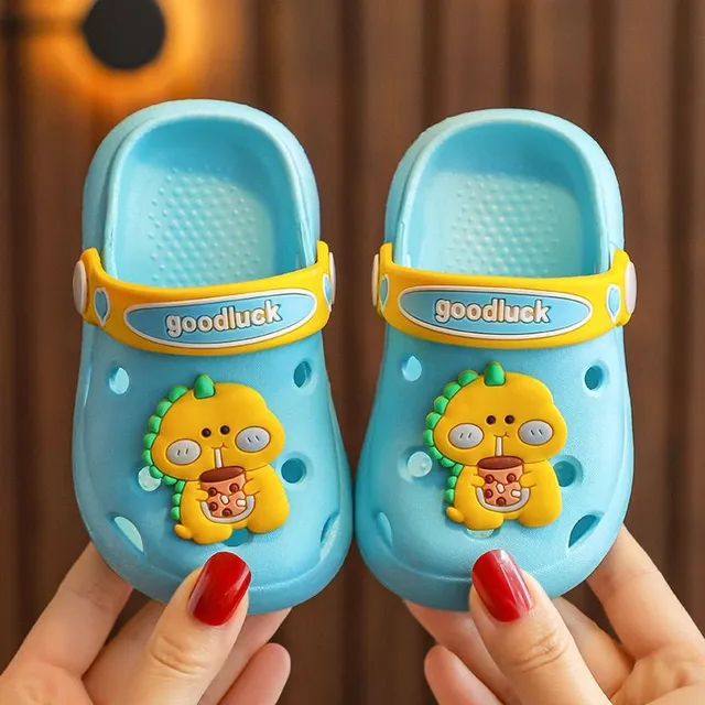 Children's perforated foam slippers with cute accessory