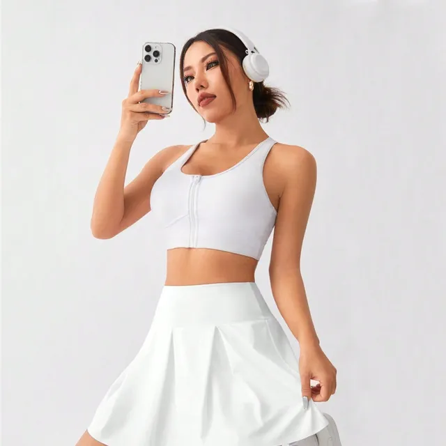 Tennis skirt with a wide ribbon in the waist and a volley line for active movement