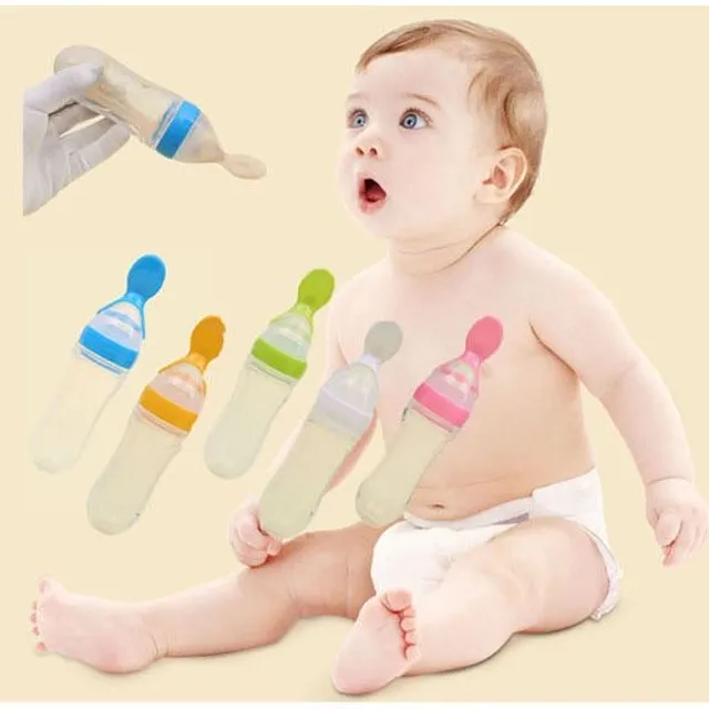 Baby bottle with spoon for feeding