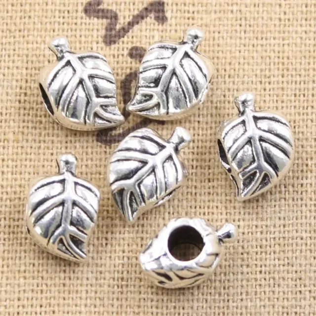 10 pcs of large hole beads with leaves of trees in antique silver color for jewelry production