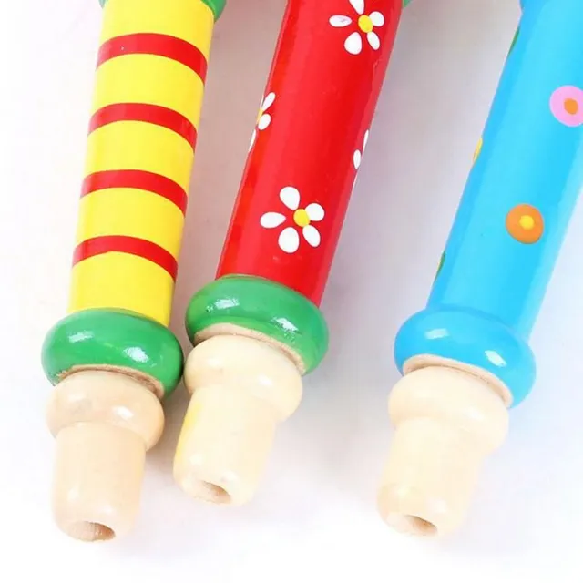 Happy children's wooden whistle