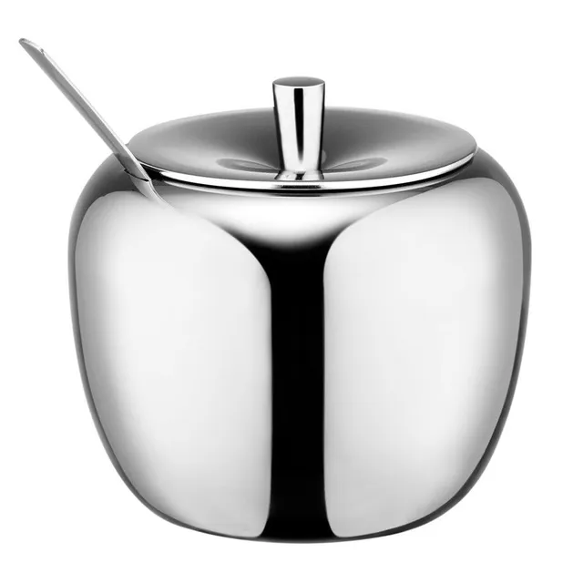 Stainless steel sugar with a spoonful of apple