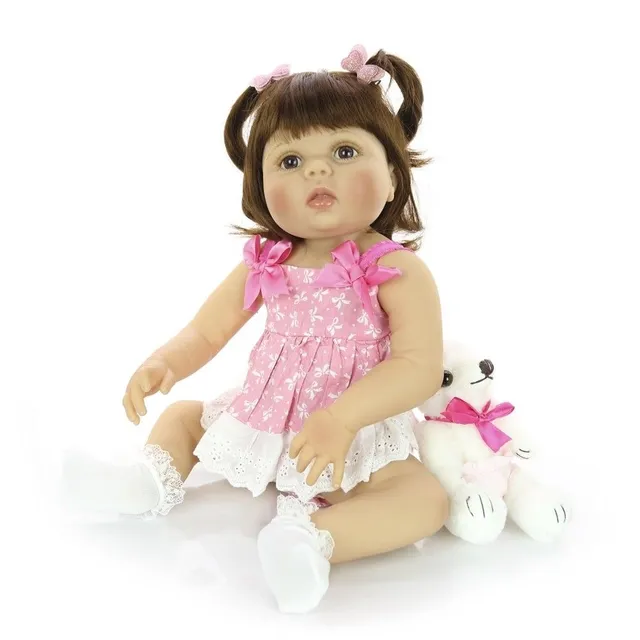 Realistic doll with accessories 57 cm