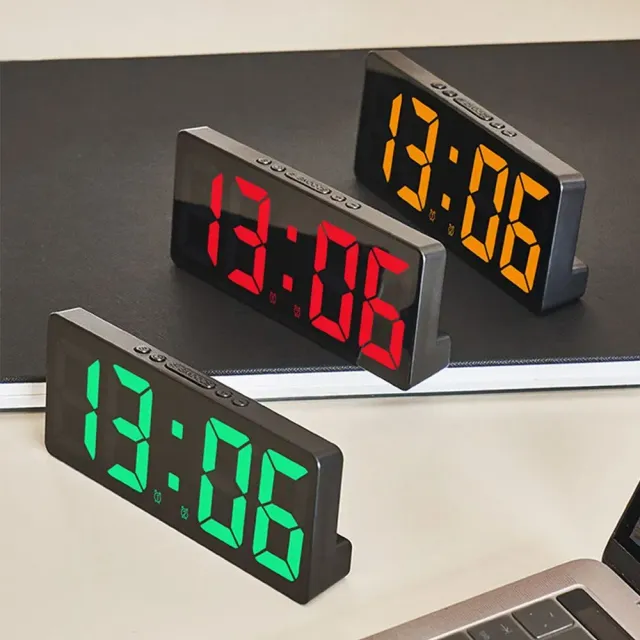 Digital alarm clock with LED display and temperature