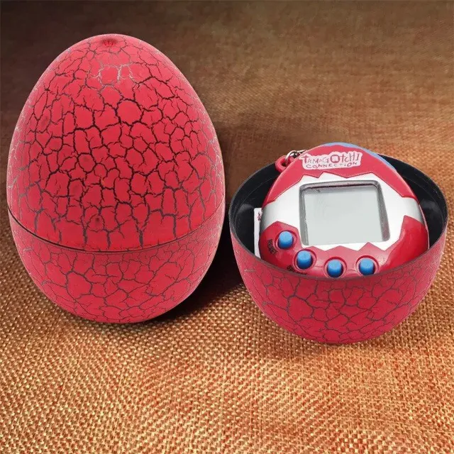 Colored egg with Tamagochi dinosaur - virtual electronic pet - manual digital game