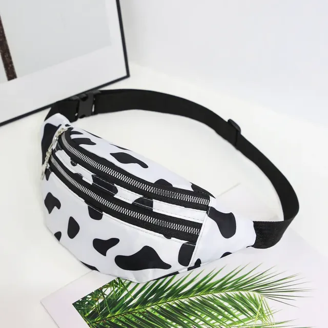 Stylish fanny pack with two pockets with cow's coat motif - black and white, adjustable strap