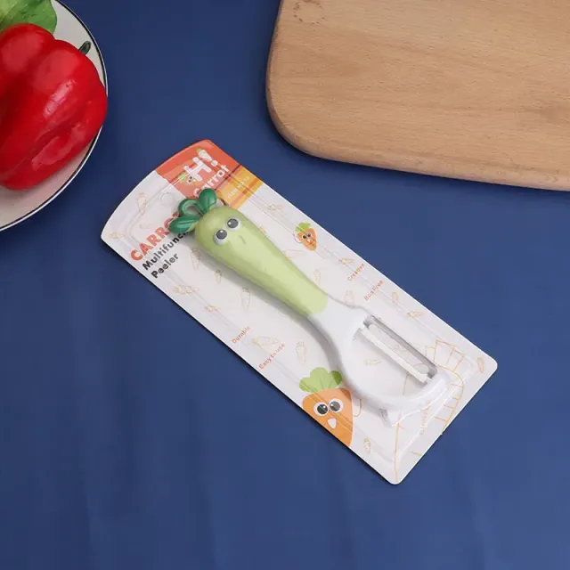 Design zeleninový peeler s zábavnou témou tváre - mrkva, reďkovka, petržlen