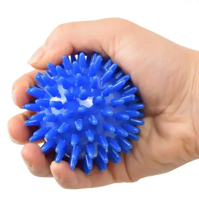 Massage ball with barbs for relief from muscle, joint and feet pain