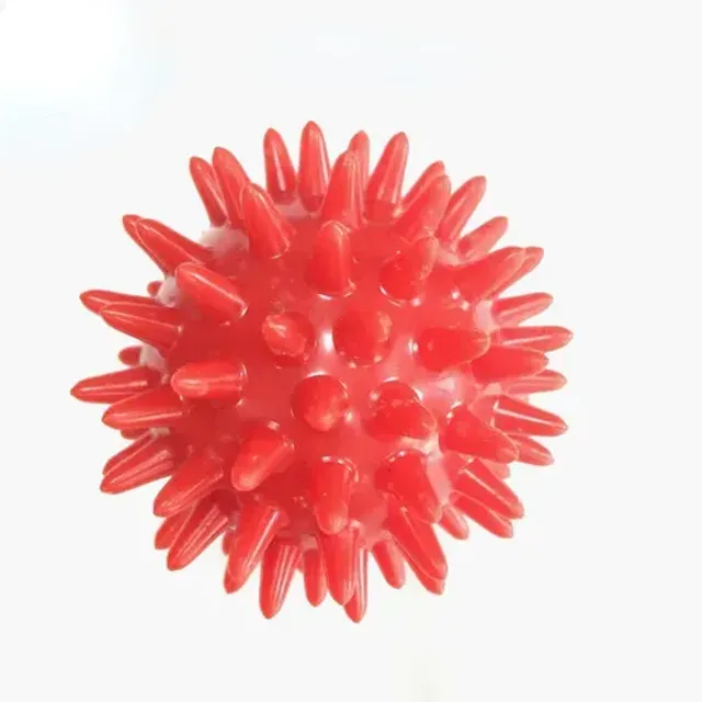 Massage ball with barbs for relief from muscle, joint and feet pain