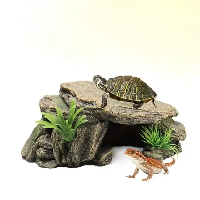 Decoration into aquariums and terrariums for reptiles - rocky shelters, caves, mountains, resinary house, substrate for reptiles