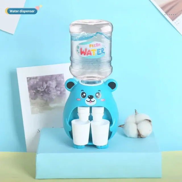 Mini water dispenser for children with cute motif for simulation of cold/hot water