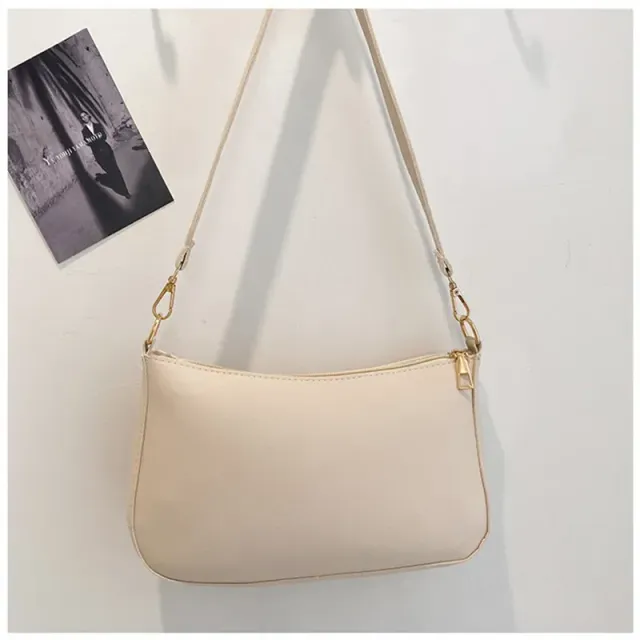 Women's retro smaller plastic leather bag with monochrome design