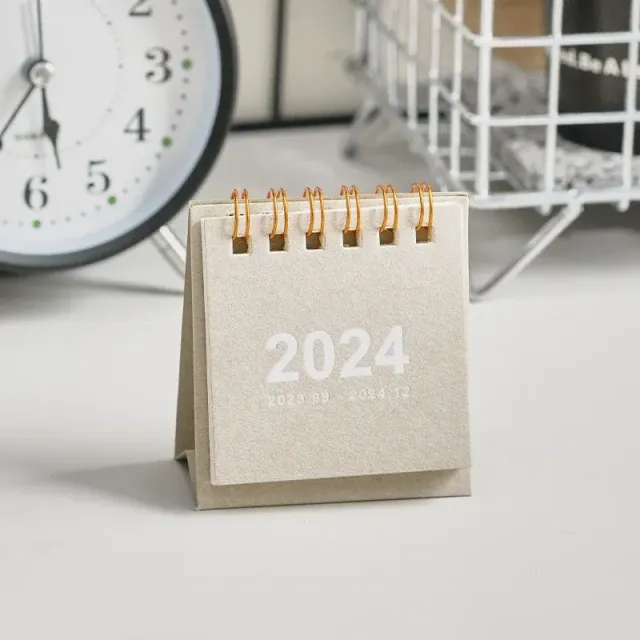 Mini table calendar for 2024 in single colour design - daily planner, annual organizer and table decoration