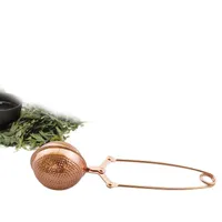 Praktický kovový držák na koření nebo pro louhování sypaného čaje