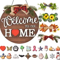 Village welcome signs with 4 seasonal wreaths