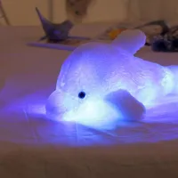 Illuminated plush dolphin with LED
