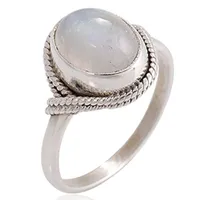 Elegant women's ring in silver color with cut mineral detail