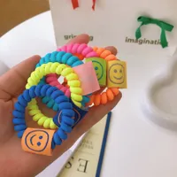 Fluorescent spiral rubber with smiley face