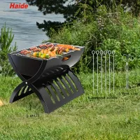 Miniature charcoal grill, portable barbecue on BBQ, folding outdoor cooker, integrated folding camping cooker on barbecue