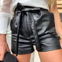 Women's stylish leather shorts with a bow at the waist