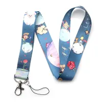 Keychain on the neck with the motive of the cartooned Little Prince