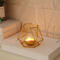 Golden retro candle with candle tray, wedding decoration, parties and table at home