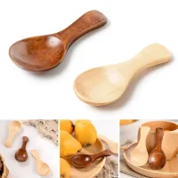 Wooden teaspoon, honey, coffee, spices and other kitchen ingredients