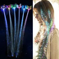 Artificial strands of hair with a glowing bow tie